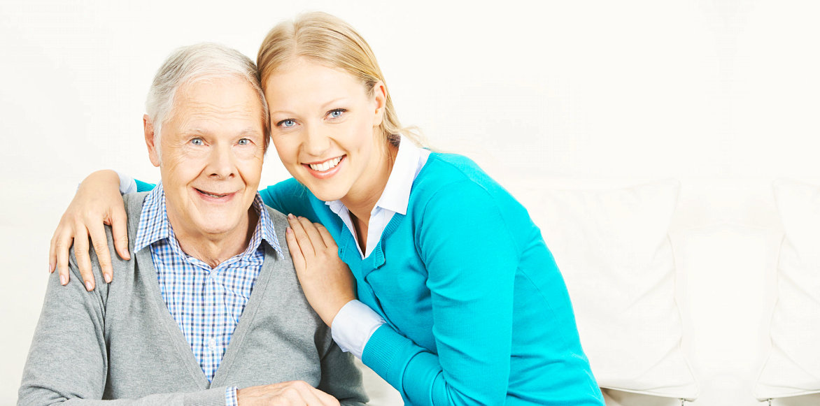 elderly man together with the caregiver